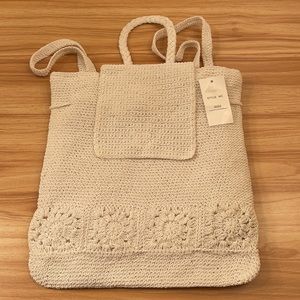 Knit off white drawstring backpack